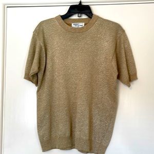 Shimmery gold short sleeve top. Size L. Short banded sleeves and banded bottom.
